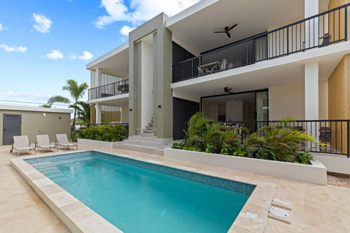 ข่าวล่าสุดของบริษัทเกี่ยวกับ โครงการวิลล่าแคริบเบี้ยน: ส่งเสริมชีวิตในเขตร้อน ด้วยพัดลมเพดานไม้